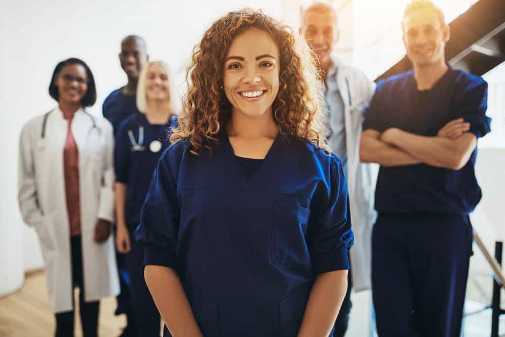 Medical staff smiling. Healthcare background screening concept.